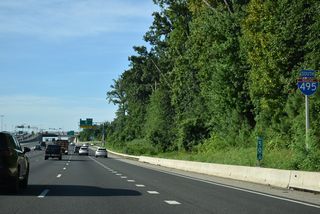 An auxiliary lane lane opens southbound from U.S. 50 to Exit 51 for SR 650 (Gallows Road).