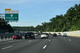 A flyover ramp elevates from the I-495 Express Lanes to cross over the I-495 southbound mainline to SR 620 (Braddock Road). SR 620 leads west to Ravensworth and east to Annandale.