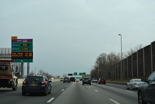 The left exit for the reversible I-95/395 Express Lanes separates from I-495 southbound. The HOT toll lanes line the middle of I-395 north to Washington and I-95 south to Fredericksburg.