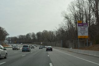 Curving east from Braddock Road and Annandale, I-495 advances toward the Springfield Interchange and a left exit for the I-95/395 Express Lanes.