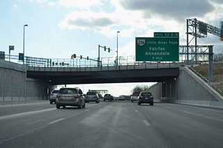 Interstate 495 next meets SR 123 (Little River Turnpike) at a cloverleaf interchange (Exits 52A/B).