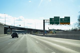Exit 54 splits into separate ramps for SR 620 west to George Mason University and east to North Springfield.