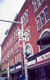 U.S. 2 Business (State Street) continues west to the Vermont State Capitol while VT 12 leads north to a roundabout with Spring Street.