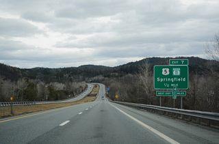 U.S. 5/VT 11 overlap between nearby Missing Link Road and Connecticut River Road adjacent to the New Hampshire state line.