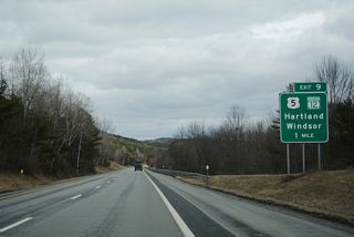 The diamond interchange at Milepoint Exit 60 links I-91 with U.S. 5/VT 12 just inside the town of Hartland.