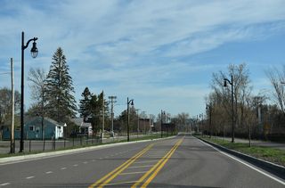 Champlain Parkway proceeds north from Home Avenue three blocks to Flynn Avenue. There are no intersections along this stretch.