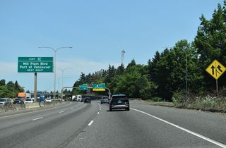 The stretch of I-5 through Vancouver has a markedly different feel from the narrow right of way through Portland. The freeway is at least six lanes wide and long, multi-lane exit ramps provide access to surface streets.