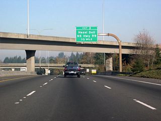 Main Street heads north between the Lincoln and Shumway neighborhoods in Vancouver to become NE Highway 99 (former U.S. 99) at Interstate 5. North into the large unincorporated community of Hazel Dell, the arterial expands into a five lane, commercial boulevard.
