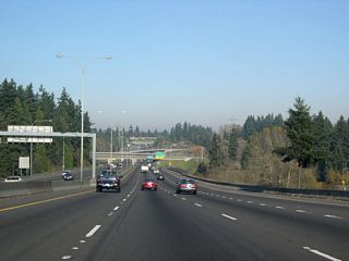 Past Exit 2, I-5 northbound crosses Burnt Bridge Creek and the broad, shallow "canyon" that runs northwest to southeast through much of Vancouver. Designated as the Burnt Bridge Creek Greenway, this swath of intermittently forested and open land boasts miles of hiking and biking trails.