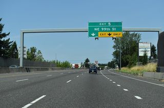 I-5 passes Hazell Dell Town Center and other retail to Exit 5 in north Hazell Dell.