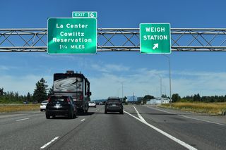 NW LaCenter Road arcs southwest across the city of La Center to a dogbone interchange (Exit 16) with Interstate 5.