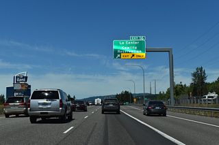 Guide signs for Exit 16 previously referenced La Center Road, and before that the older NW 319th Street designation.