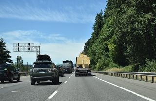 The BNSF Railroad runs between the north and southbound roadways of Interstate 5 from Exit 22 to Martin Bluff along the Columbia River.