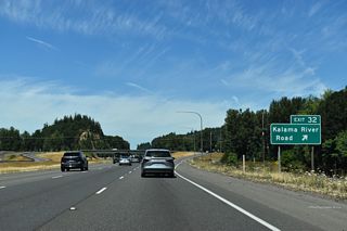 Kalama River Road follows the course of the Kalama River east into the Cascade Range foothills, south of Mount Saint Helens.