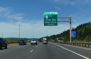 Kelso Drive comprises an east side frontage road for Interstate 5 north leading into Kelso from Old Pacific Highway S (Old U.S. 99/830). Paralleling I-5 to the west, Talley Way heads north to an industrial park area by Southwest Washington Regional Airport (KLS).
