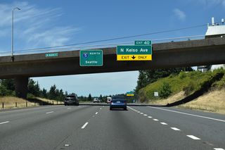 An auxiliary lane extends north from Exit 39 to the diamond interchange (Exit 40) with N Kelso Avenue and Holcomb Road.