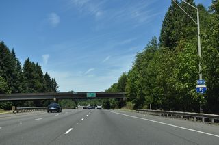 Pleasant Hill Road spans I-5 beyond this reassurance shield at the unincorporated community of Ostrander.