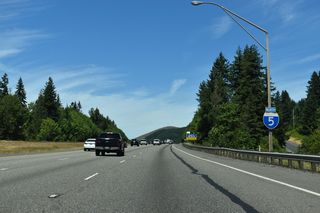 Continuing north to Castle Rock, Interstate 5 runs between Pleasant Hill Road and Bond Road east of the BNSF Railroad and Cowlitz River.