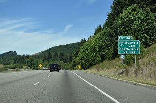 Locally maintained along Huntington Avenue S, Business Loop I-5 to Castle Rock loops diverges west from the diamond interchange at Exit 49.