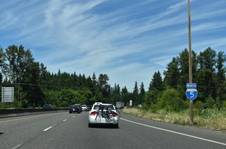 Interstate 5 shifts northeast through an S-curve across Smokey Valley, east of Foster Creek.