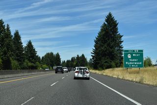 Continuing north, RIRO (right in right out) ramps at Exit 59 link Interstate 5 with the intersection of Cowlitz Loop Road south, Mulford Road east and Cowlitz Ridge Road north.