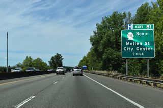 The split diamond interchange at Exit 81 in Centralia joins I-5/U.S. 12 with Art Lehman Avenue east to Yew Street and OR 6 along Mellon Street west of the city center.