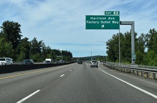 The entrance ramp OR 507 (Mellen Street) forms a lengthy distributor roadway north to the diamond interchange (Exit 82) with Harrison Avenue. Harrison Avenue angles southeast to Main Street and Downtown Centralia.