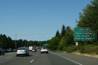Exit 105 diverges into separate ramps for 14th Avenue SE south to Henderson Boulevard and north to the Washington State Capitol.