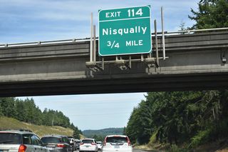 Martin Way (Old U.S. 99/410) returns to Interstate 5 at a wye interchange east of the half diamond interchange (Exit 114) with Nisqually Cut-Off Road.