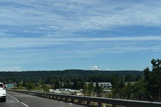 Mount Rainer appears along the eastern horizon beyond Bartlett Hill and the Nisqually Basin.