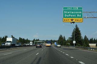 Stage 3 construction from 2023 to 2026 replaces the diamond interchange with at Exit 119 with a new half diverging diamond interchange joining I-5 with a realignment of DuPont-Stellacoom Road spanning the adjacent UP Railroad to a new roundabout (WSDOT, 2025).
