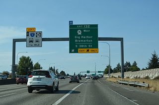 I-5 - SR 16 Tacoma/Pierce County HOV Program construction expanded I-5 to four roadways between SR 16 and the south end of I-705. Exit 132 departs as a c/d roadway for 38th Street, SR 16 and I-705/SR 7.
