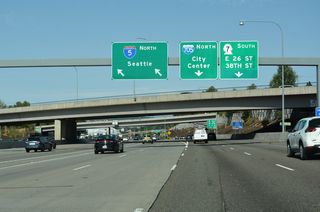 The c/d roadway from Exit 132 returns to the Interstate 5 mainline at the S Yakima Avenue overpass.
