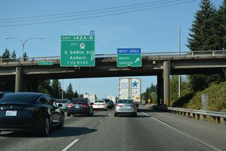 S 375th Street passes over Interstate 5 north at the rest area / weigh station off-ramp. The first of three exits to Federal Way joins I-5 with SR 18, a freeway leading northeast to Auburn, Covington and Hobart.