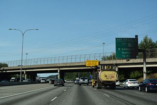 SR 161 (Enchanted Parkway) spans I-5 a half mile south of the systems interchange (Exit 142) with SR 18. SR 18 travels 28.41 miles overall from the intersection of S 348th Street and SR 99 (Pacific Highway) in Federal Way to Interstate 90 at Exit 25.