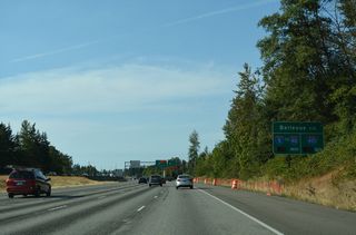 A dynamic travel time sign for Bellevue via I-5 north to I-90 east or I-405.