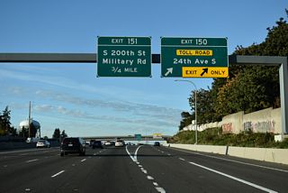 Meeting the freeway at a parclo A2 interchange (Exit 151) adjacent to S 200th Street, Military Road continues alongside Interstate 5 from Kent to Seatac.