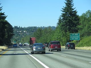 Exit 153 departs for parallel Southcenter and Tukwila Parkways ahead of the ramps for Interstate 405 north and SR 518 west. Exit 153 serves the adjacent Southcenter Mall.