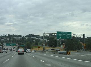 Southcenter Mall lies north of a pervasive warehouse and commercial area bound by Southcenter Parkway and SR 181 (Valley Parkway). Northward, Southcenter Parkway becomes Tukwila Parkway east to 66th Avenue S at the Green River.