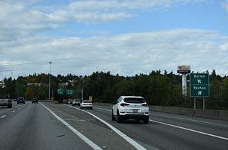Exit 154 B connects with I-405 north to Renton, Newcastle and Bellevue. Exit 154 A joins the left lanes of SR 518 west to Seatac and Burien.