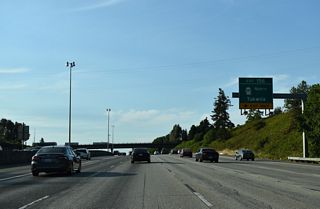 SR 599 constitutes a 1.75 mile freeway connecting Exit 156 with SR 99 (W Marginal Way) in north Tukwila. SR 99 ends at SR 518 in SeaTac and resumes at the exchange joining SR 599 with Tukwila International Boulevard. The stretch along Tukwila International Boulevard in between was decommissioned in 2004 (AARoads Wiki, 2025).