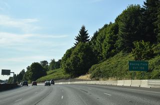 S Boeing Access Road west from Exit 158 to Airport Way and E Marginal Way north leads to King County International Airport - Boeing Field (BFI).