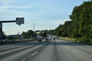 A brief roadway separation follows along Interstate 5 along the hills east of King County International Airport - Boeing Field (BFI).