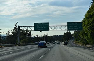 Exit 161 ascends from I-5 north to Swift Avenue. Graham Street leads east to Holly Park and Brighton while S Albro Place crosses the freeway and adjacent railroad lines west to Ellis Avenue at the Georgetown section of the city.Exit 162 departs next as part of a pair of directional ramps to industrial areas along Corson Avenue and Michigan Street at Georgetown.