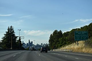 Interstate 5 continues with roadways at different grades through South Seattle. Port of Seattle facilities are located along Harbor Island north of Pigeon Point.