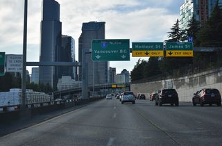The exit to James Street precedes the 7th and Madison Streets exit for the Washington State Convention Center.