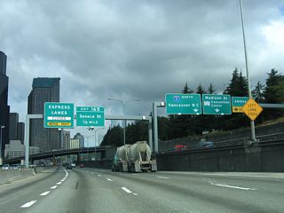 The start of the Express Lanes shifted a half mile south of Exit 165 to Seneca Street by 2019. They commence separates from the general travel lanes by a double white line.