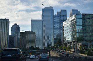The c/d roadway from Exit 164 A concludes where Interstate 5 lowers to pass beneath Madison and Spring Streets ahead of the Central Freeway Park cut and cover tunnel.