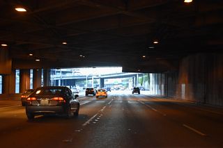 Exit 166 to Olive Way separates from I-5 north just beyond the last of the tunnels. Boren Avenue and Pine Street intersect above the freeway mainline in this scene.