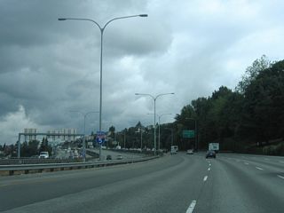 Pictured here when traffic was flowing well, it is common to see heavy congestion at the "Mercer Street Merge" due to the weaving traffic movements between the Mercer Street entrance ramp and SR 520 exit ramp.